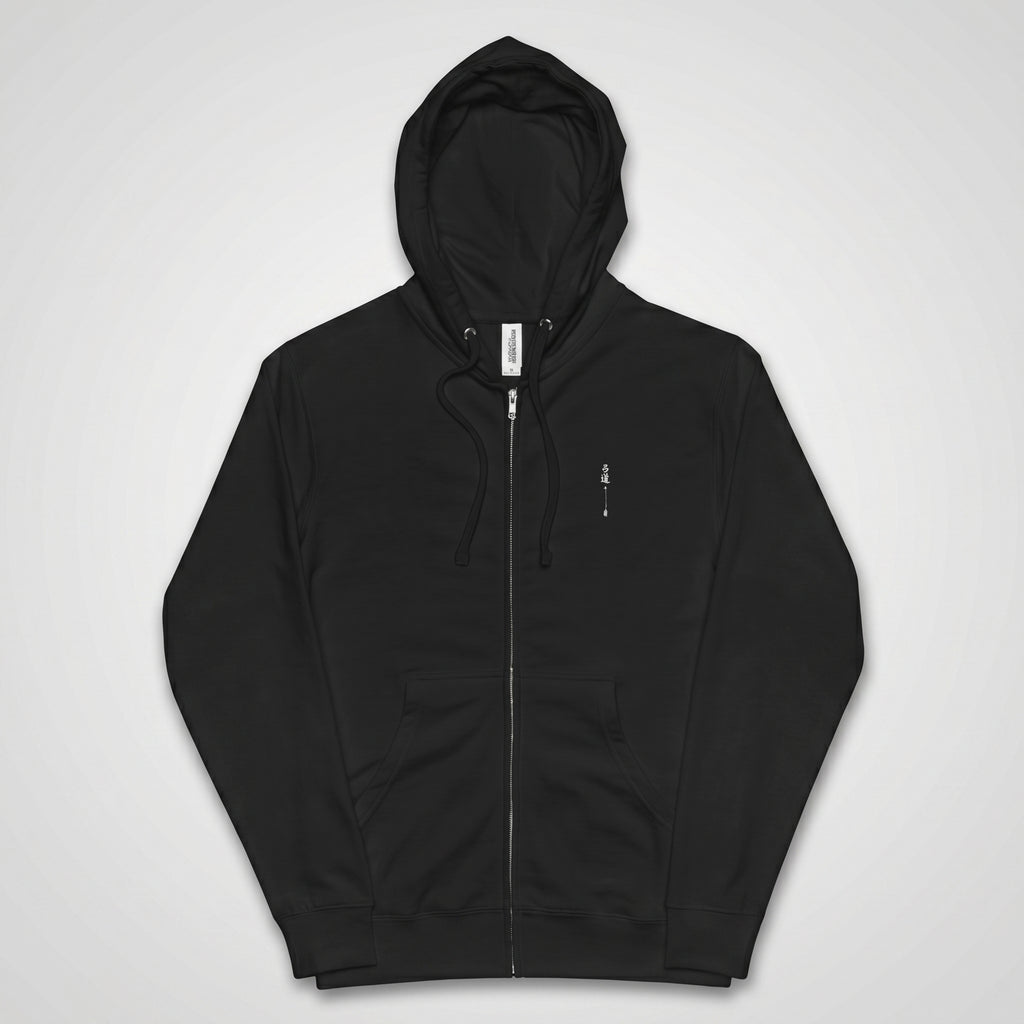 Black unisex zip-up hoodie, front view, with small embroidered Kyūdō archer calligraphy on left chest and MINDŌ Studio label at collar
