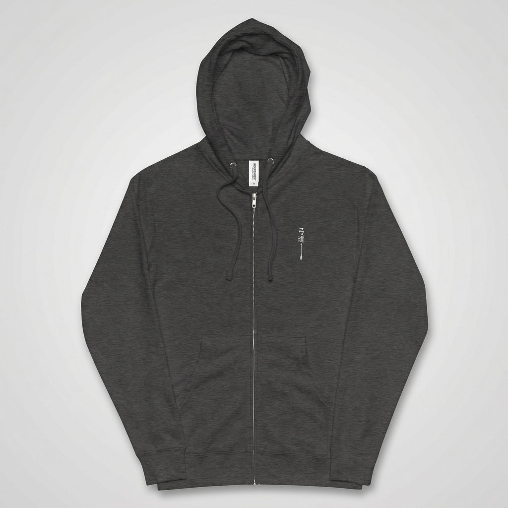 Charcoal grey unisex zip-up hoodie, front view, with small embroidered Kyūdō archer calligraphy on left chest and MINDŌ Studio label at collar, light grey background

